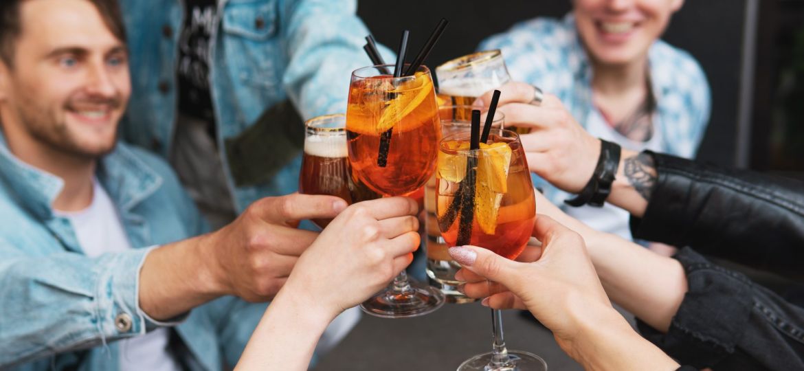 friends-celebrating-and-holding-glasses-with-diffe-2023-09-29-16-43-35-utc (Demo)