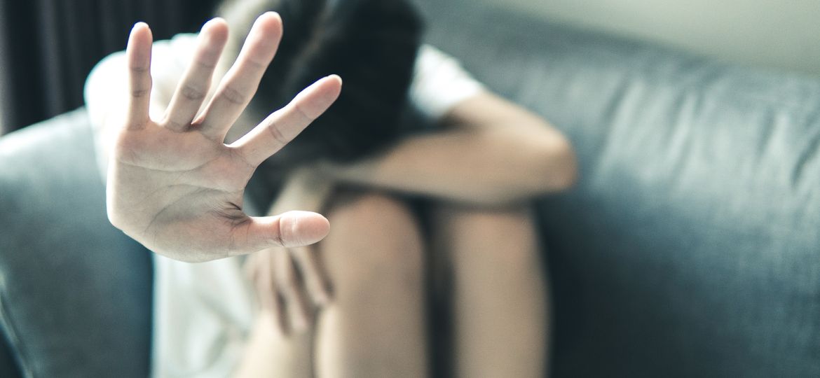 Women Abused In Her Home Holding Her Hand Up. Stop Sexual Harass (Demo)